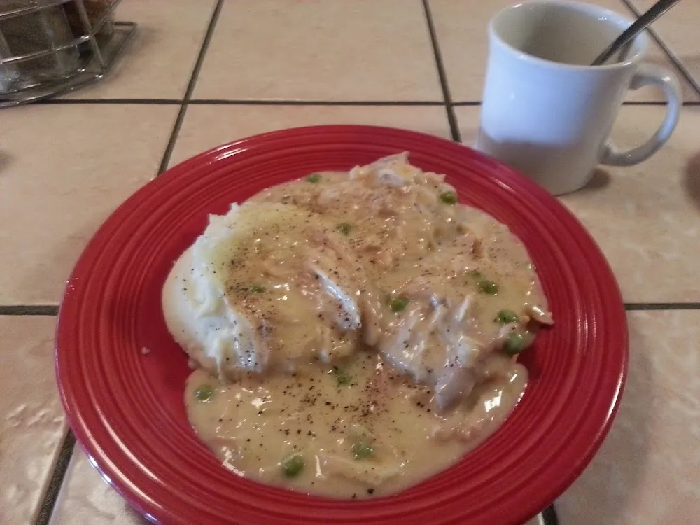 Cream Chicken over Biscuits and Gravy
